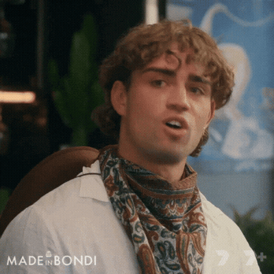 Man With Curly Hair And Scarf GIF
