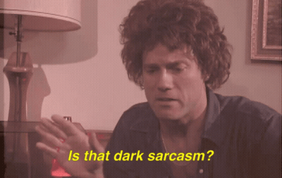 Man With Curly Hair Asking If That Dark Sarcasm GIF