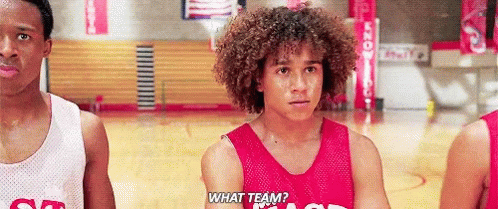 Man With Curly Hair Asking What Team On Basketball Court GIF