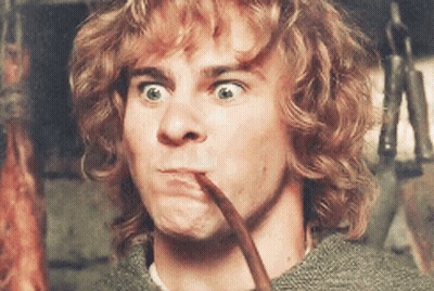 Man With Curly Hair Holding Pipe Making Funny Face GIF