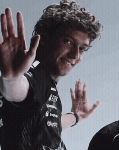 Man With Curly Hair In Black Shirt Saying UBS GIF