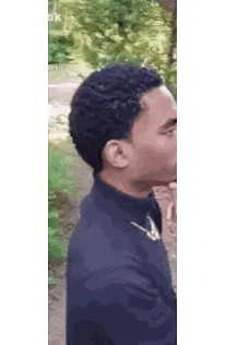Man With Curly Hair In Black Sweater And Gold Necklace Sticker
