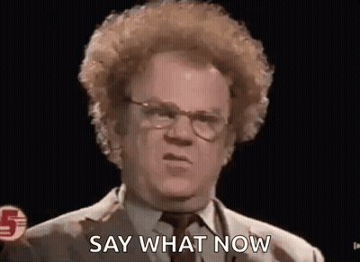 Man With Curly Hair In Glasses And Suit GIF