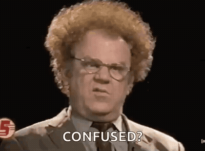 Man With Curly Hair In Suit And Tie Saying Confused GIF