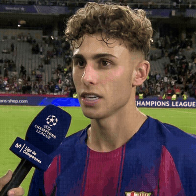 Man With Curly Hair Interviewed Champions League Microphone GIF