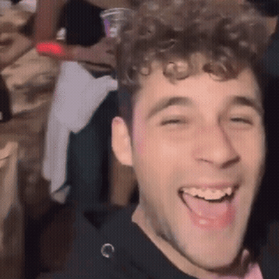 Man With Curly Hair Laughing GIF