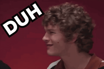 Man With Curly Hair Making Duh Face GIF