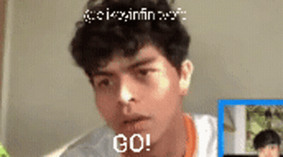 Man With Curly Hair Making Funny Face Saying Go GIF