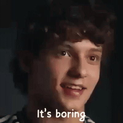 Man With Curly Hair Making Funny Face Saying It's Boring GIF