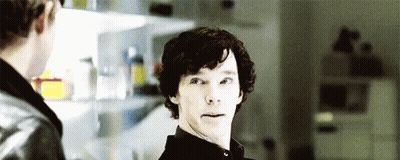 Man With Curly Hair Next To Man In Kitchen GIF
