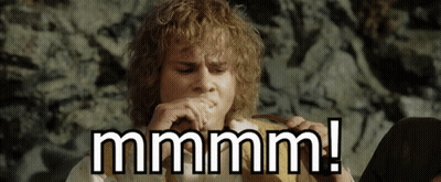 Man With Curly Hair Playing Harmonica Saying Mmmm GIF