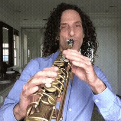 Man With Curly Hair Playing Saxophone GIF