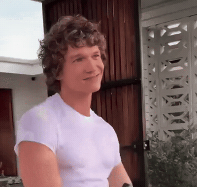 Man With Curly Hair Smiling GIF