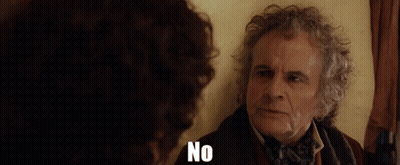 Man With Curly Hair Talking To Man Saying No GIF