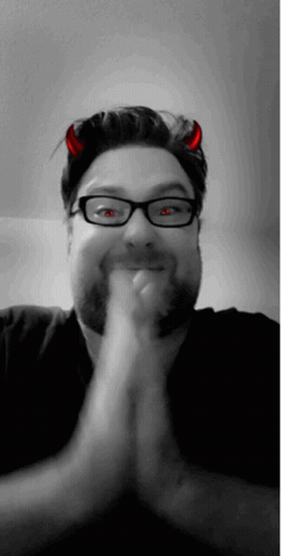 Man With Devil Horns Smiling GIF