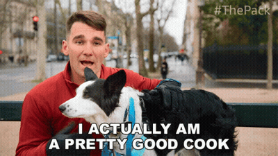 Man With Dog Says I Actually Am Pretty Good Cook GIF