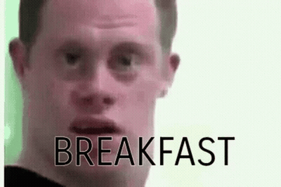 Man With Down Syndrome Making Funny Face Breakfast GIF