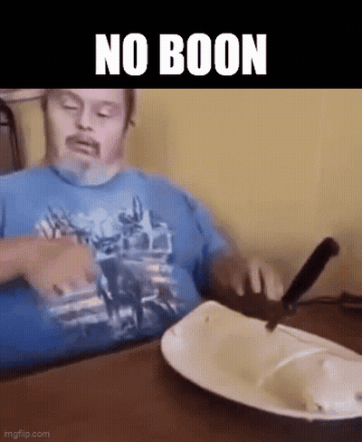 Man With Down Syndrome Sitting At Table With Plate And Knife GIF