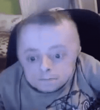 Man With Down Syndrome Wearing Headphones Making Funny Face GIF