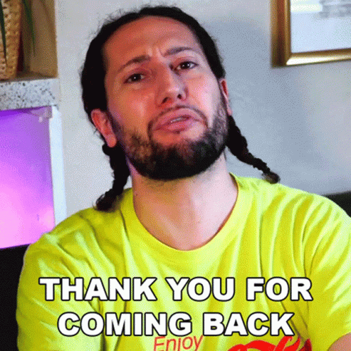 Man With Dreadlocks And Beard Wearing Thank You Shirt GIF