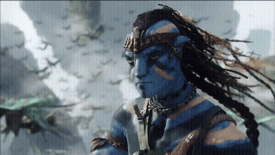 Man With Dreadlocks And Blue Face Standing Before Birds GIF