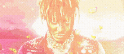 Man With Dreadlocks And Necklace In Pink Jacket GIF