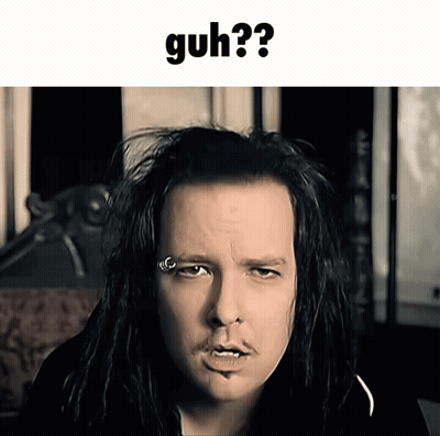 Man With Dreadlocks And Nose Piercing Making Funny Face Saying Guh GIF