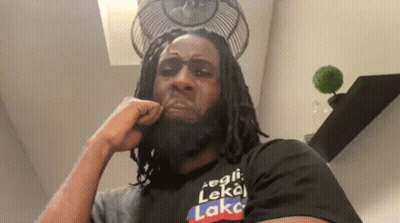 Man With Dreadlocks Beard Black Shirt Saying Lake GIF