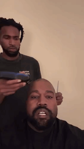 Man With Dreadlocks Getting Haircut GIF