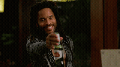 Man With Dreadlocks Holding Beer And Smiling GIF