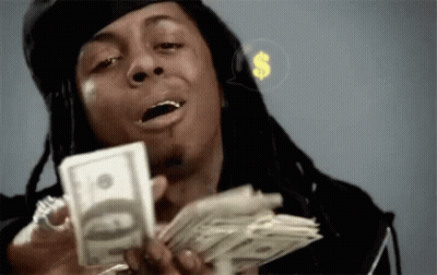 Man With Dreadlocks Holding Stack Of Money GIF