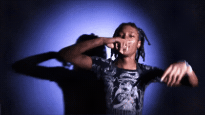 Man With Dreadlocks In Black Motorcycle T-Shirt GIF
