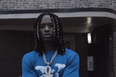 Man With Dreadlocks In Blue Shirt Saying O GIF