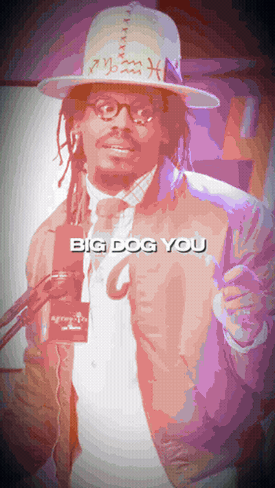 Man With Dreadlocks In Hat And Jacket Saying Big Dog You GIF