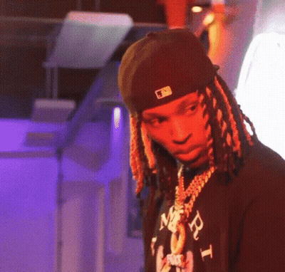 Man With Dreadlocks In Hat And Necklace GIF