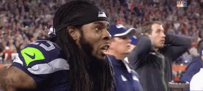 Man With Dreadlocks In Nike Headband Watching Game GIF