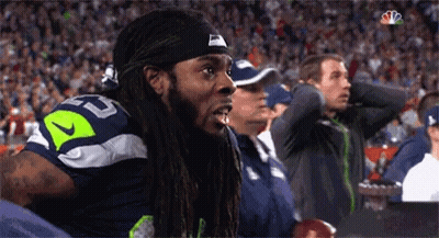 Man With Dreadlocks In Nike Headband Watching Sports Game GIF