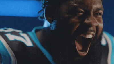 Man With Dreadlocks In Panthers Jersey And Gloves GIF
