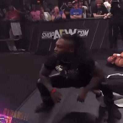 Man With Dreadlocks In Wrestling Ring GIF