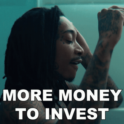 Man With Dreadlocks Looking In Mirror Saying More Money To Invest GIF