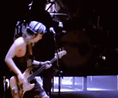 Man With Dreadlocks Looks At Camera With Million Stories Logo GIF