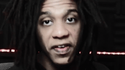 Man With Dreadlocks Making Funny Face GIF