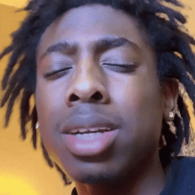 Man With Dreadlocks Making Funny Face Eyes Closed GIF