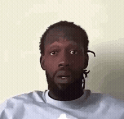 Man With Dreadlocks Making Funny Face GIF