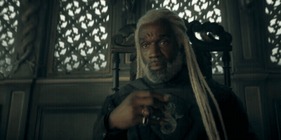 Man With Dreadlocks Saying Rough Seas Lie Ahead GIF