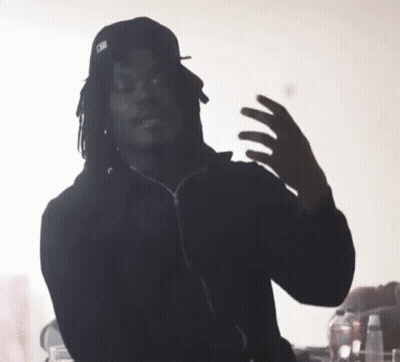 Man With Dreadlocks Saying Shhh GIF
