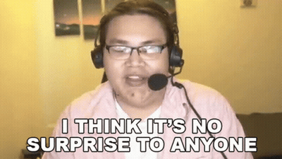 Man With Dreadlocks Smiling In Front Of PE Board GIF