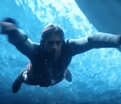 Man With Dreadlocks Swimming GIF