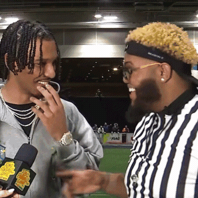 Man With Dreadlocks Talking To Referee Wearing Jackson Headband GIF