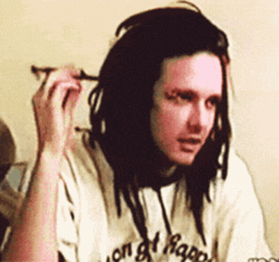 Man With Dreadlocks Wearing White Shirt Saying On Of Happiness GIF
